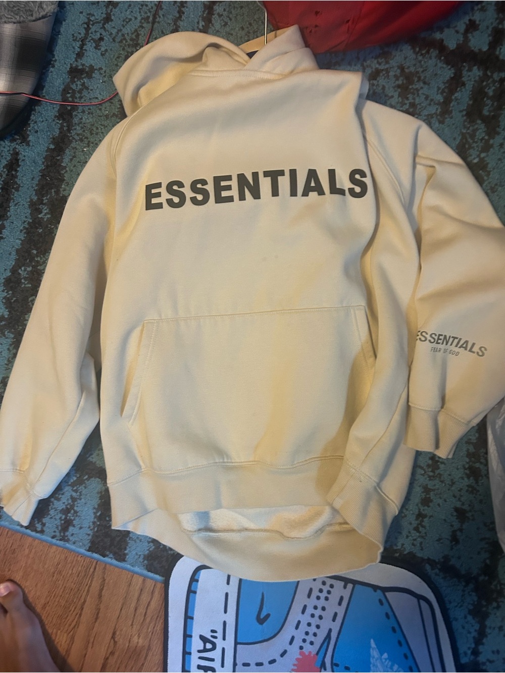 Fear of God Essentials Cream Hoodie with Front Logo